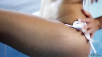 Michaela Isizzu Slides Her Booty Down Into The Pool!