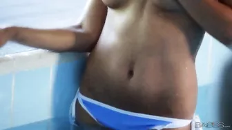 Michaela Isizzu Slides Her Booty Down Into The Pool!