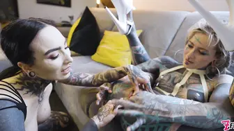 Anuskatzz Has Another Babe Covered In Tattoos Working Her Sex Holes With A Strap On!